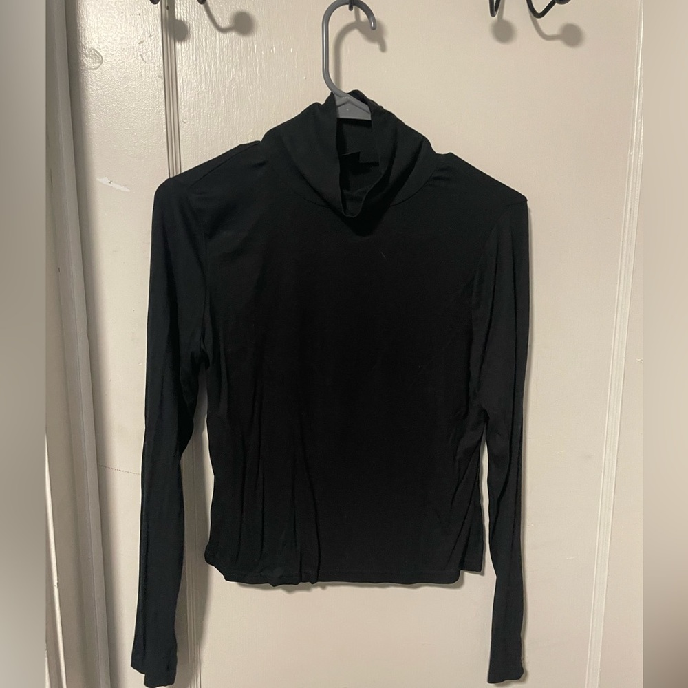 Large black turtle neck